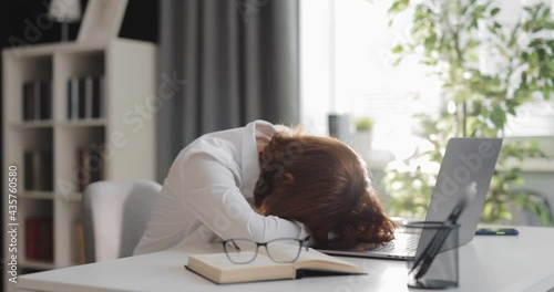 Woman tired after laptop photo