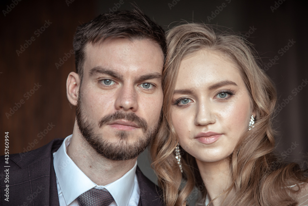 large portrait of a man and a woman. portrait of the groom and bride large portrait of a man and a woman. portrait of the groom and bride