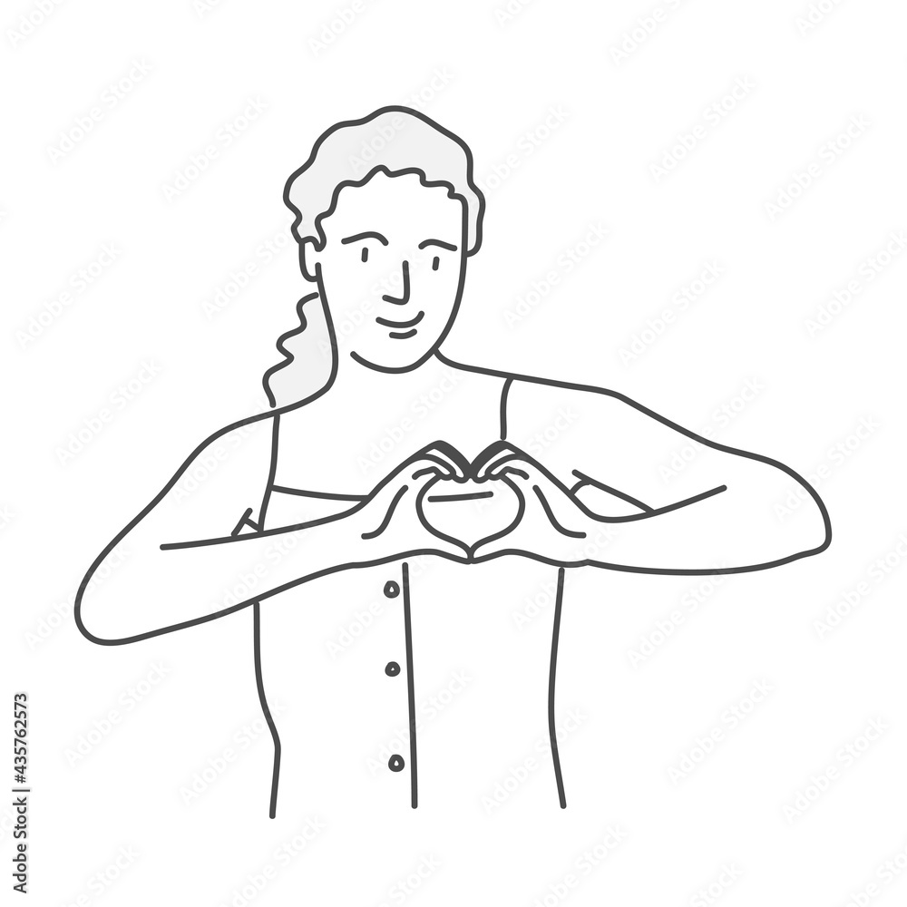 Cute woman shows heart shape gesture.