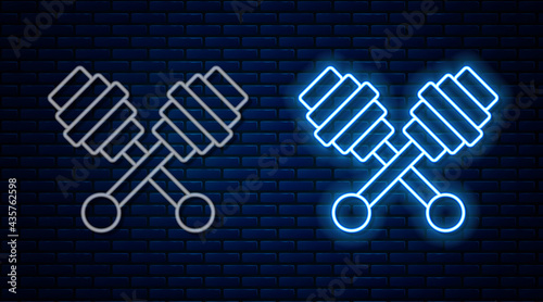 Glowing neon line Honey dipper stick icon isolated on brick wall background. Honey ladle. Vector