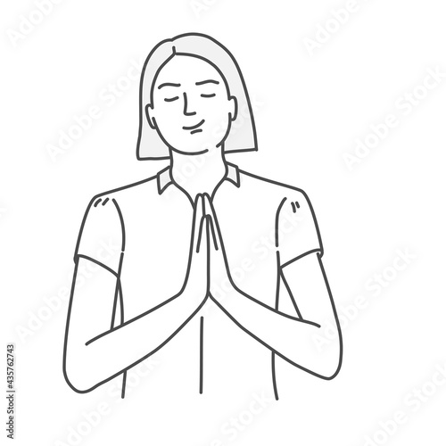 Cute girl meditates, prays with closed eyes.