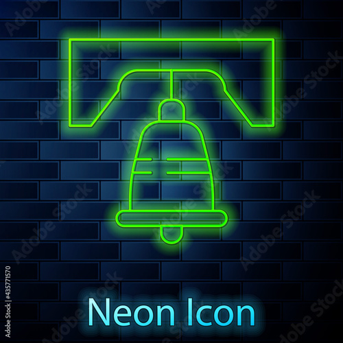 Glowing neon line Liberty bell in Philadelphia icon isolated on brick wall background. Vector