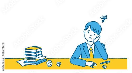 課題が多くてやる気の出ない男子学生