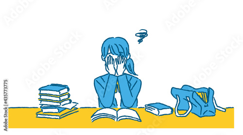 課題が多くて途方に暮れる女子学生
