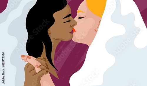 Lesbian Couple kissing in wedding gowns. 