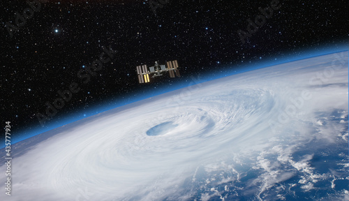 Giant hurricane seen from the space" Elements of this image furnished by NASA" © muratart