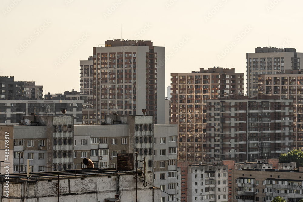 Cityscape of a stuffy city, densely built up with high-rise apartment buildings.