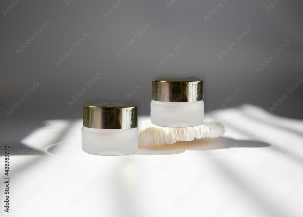 White luxury skin care bottle, jar . Add your own logo or a text, flat lay for skincare marketing White luxury skin care bottle, jar . Add your own logo or a text, flat lay for skincare marketing