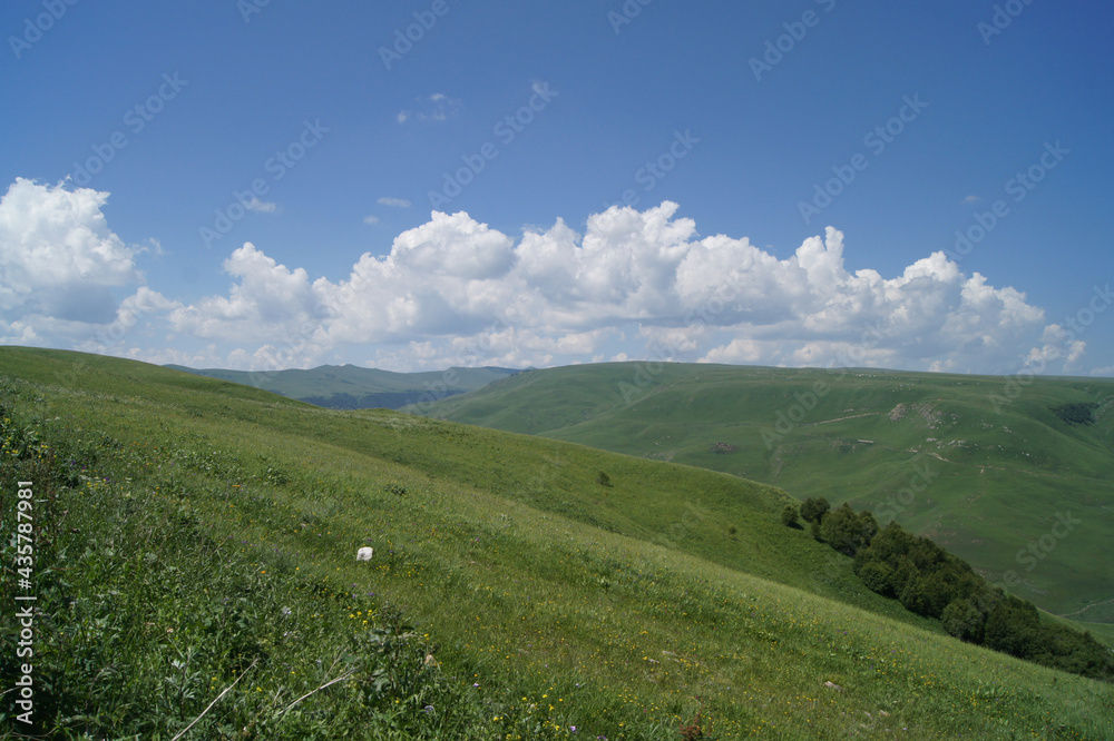 Fototapeta premium Road to the village in the mountains