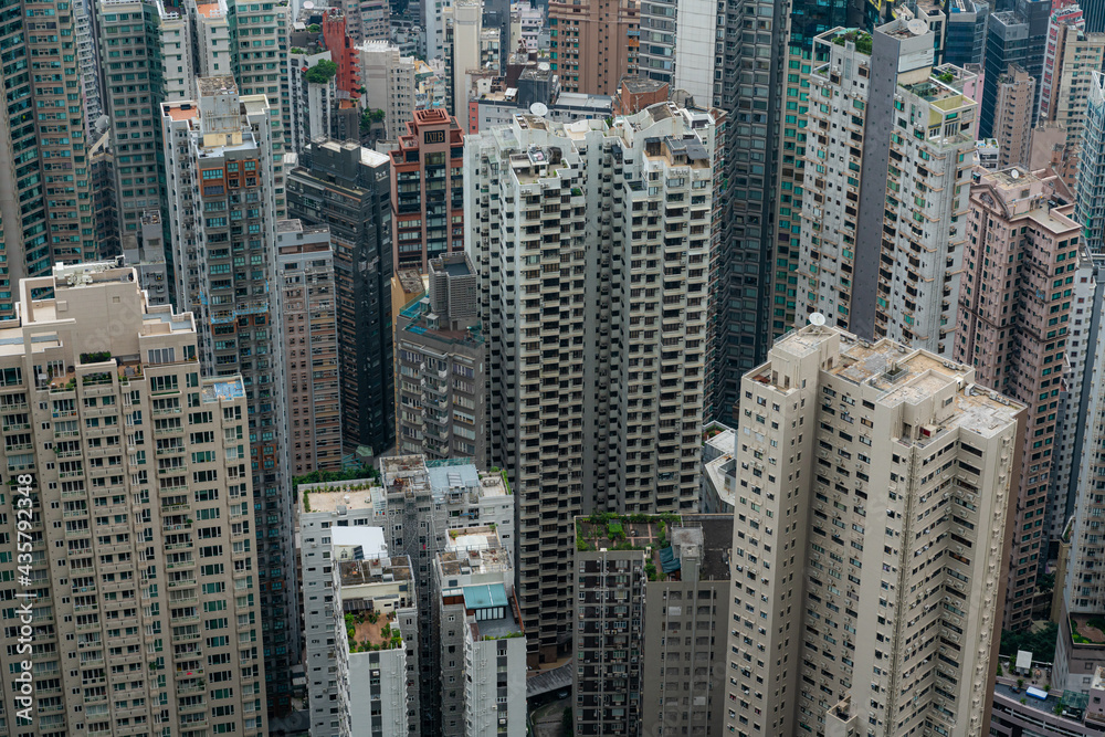 Arial view of high rise and skyscrapers building in Victoria harbor area, Hong Kong, China.