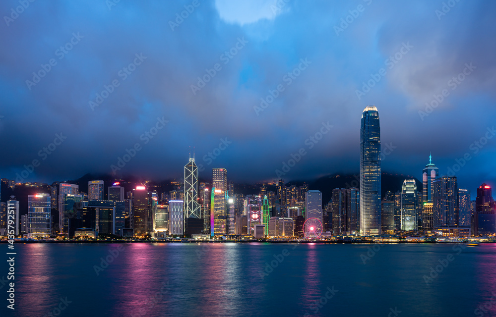 Hong Kong city skyline and skyscrapers at night, Victoria Harbour, Hong Kong, China