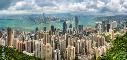 Panorama view of Hong Kong financial district skyline in a beautiful day from Victoria peak