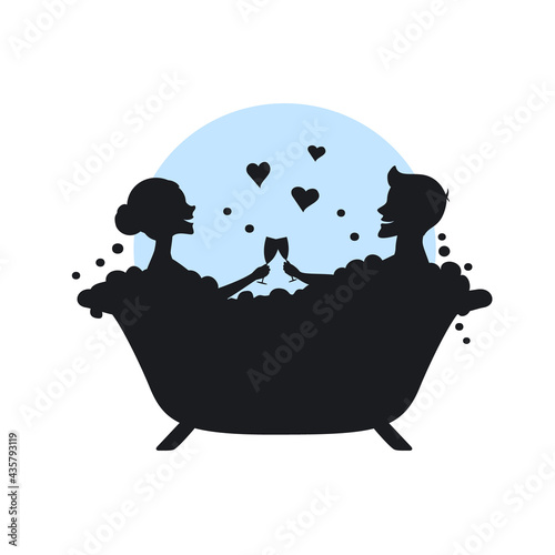 man and woman, romantic couple in love in a bathtub taking bubbled bath silhouette
