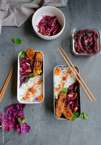 Homemade Japanese meal / Purple Cabbage Salad Bento with Shibazuke Pickle / Delicious and healthy take away vegetarian meal in bento box, ideal for busy working people photo