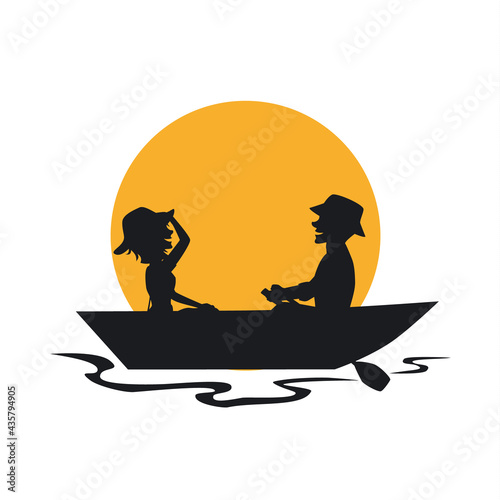 silhouette of couple having a romantic trip on a rowing boat