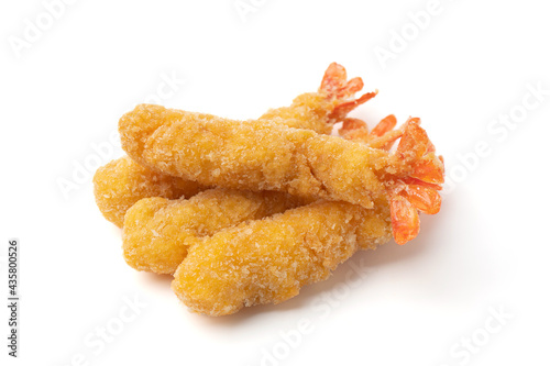 Pile of Shrimp tempura isolated on a white background. Deep-fried prawns with crispy flour and breadcrumbs.