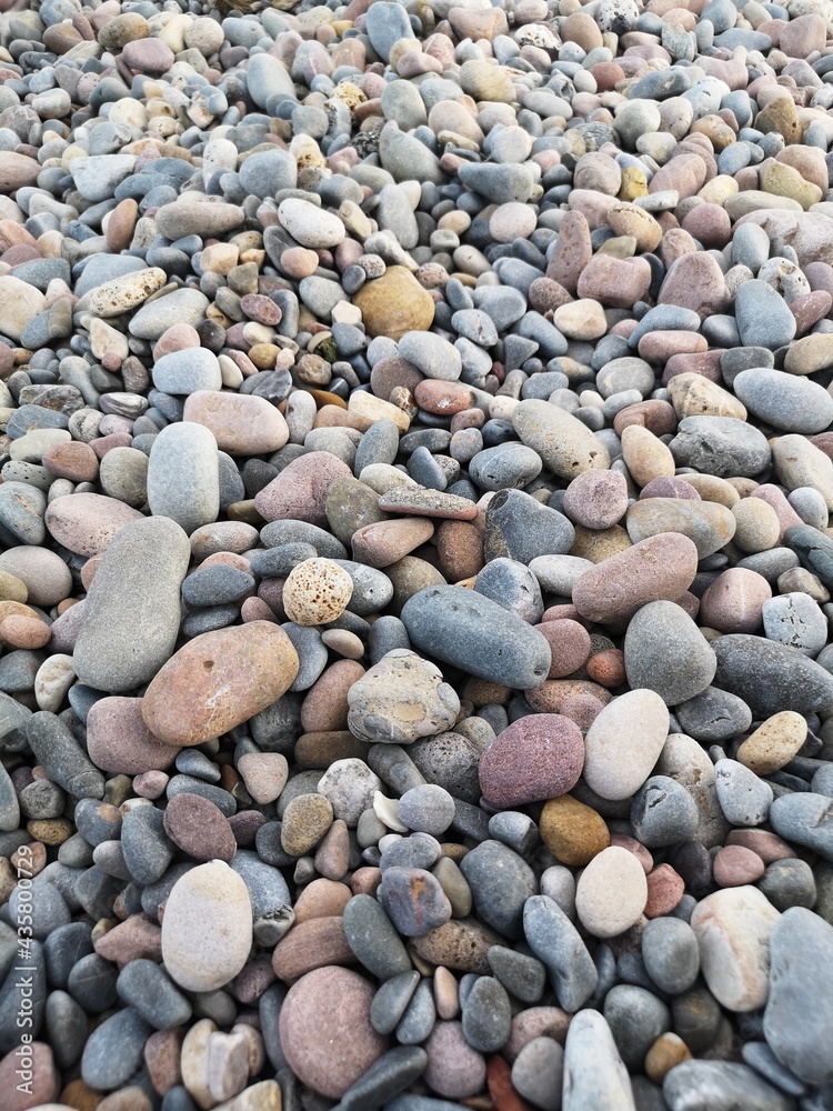Beach pebbles wallpaper by the mediterranean coast Beach pebbles wallpaper by the mediterranean coast
