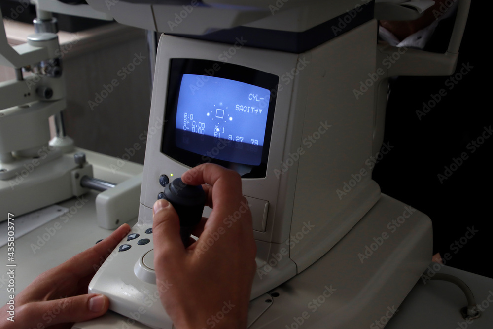 Checking the eyes during an optometry Checking the eyes during an optometry