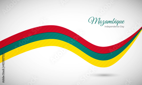 Happy independence day of Mozambique. Creative shiny wavy flag background with text typography.
