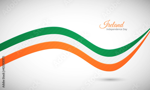 Happy independence day of Ireland. Creative shiny wavy flag background with text typography.