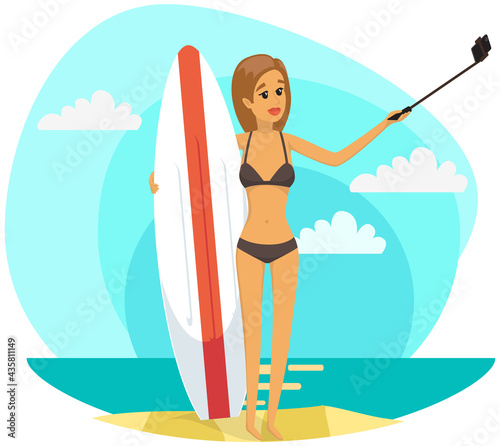 Girl is having summer vacation and surfing. Woman in swimsuit is photographed on phone camera. Lady with smartphone is posing for self portrait. Female holding surfboard is making selfie on beach