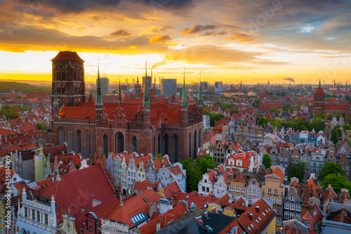 Amazing architecture of the main city in Gdansk at sunset, Poland. Aerial view of the St. Mary Basilica