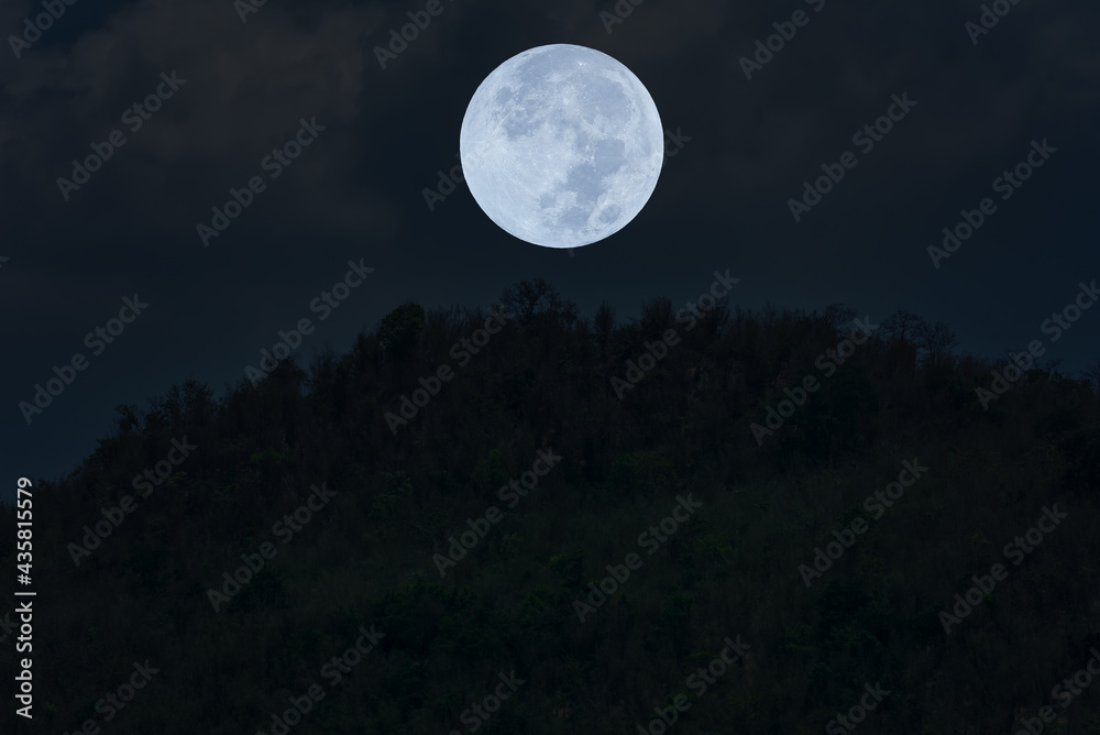 Full moon on the sky over mountain silhouette. Full moon on the sky over mountain silhouette.