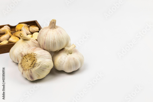 Fresh garlic on white background.