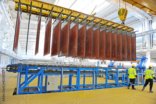 East Kazakhstan region, Kazakhstan - 12.02.2015 : Layers of cathode copper on a special lift for processing. photo