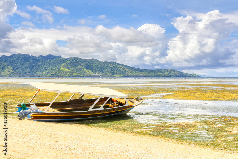 Indonesia. Gili Air Island. boat on the beach at low tide.