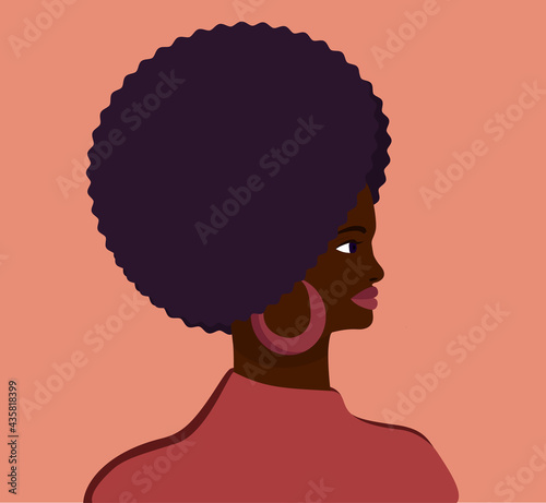 Stylish profile portrait of an African woman. Head of dark skin woman with voluminous hairstyle. Vector flat illustration