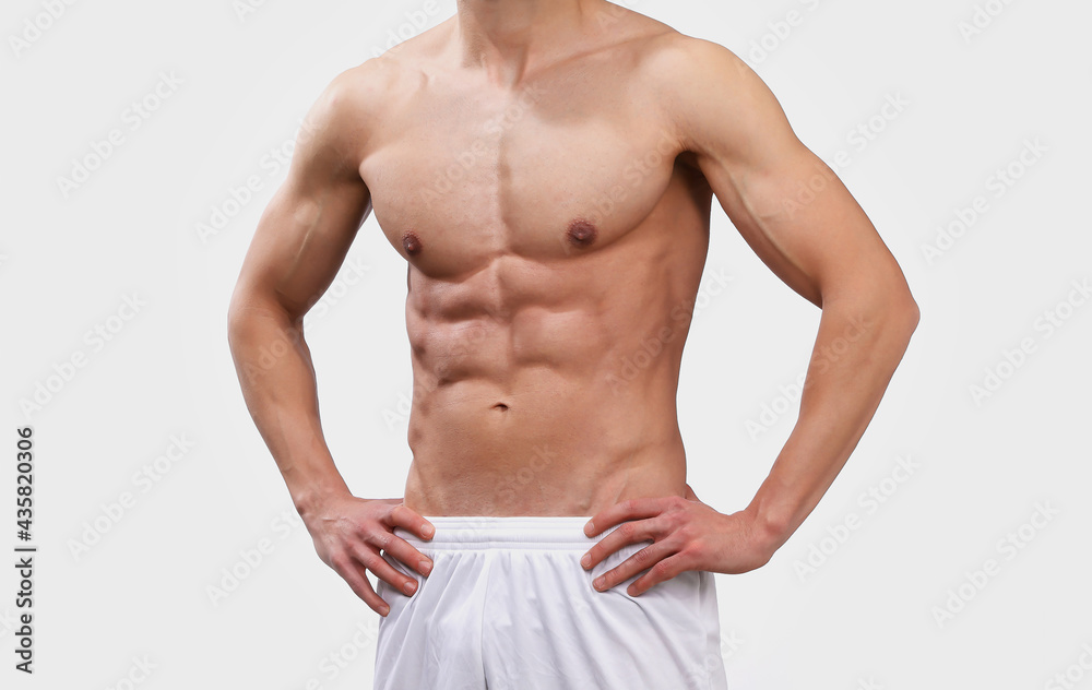 male torso - isolated male bodybuilder on white background