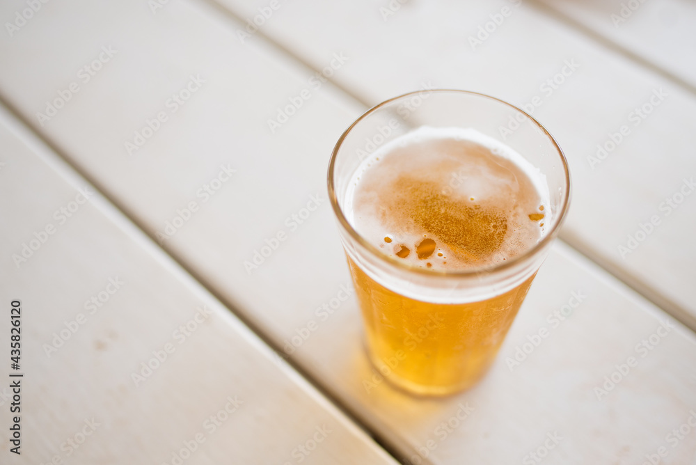 Typical Americano Glass with cold beer at a bar in Brazil Typical Americano Glass with cold beer at a bar in Brazil
