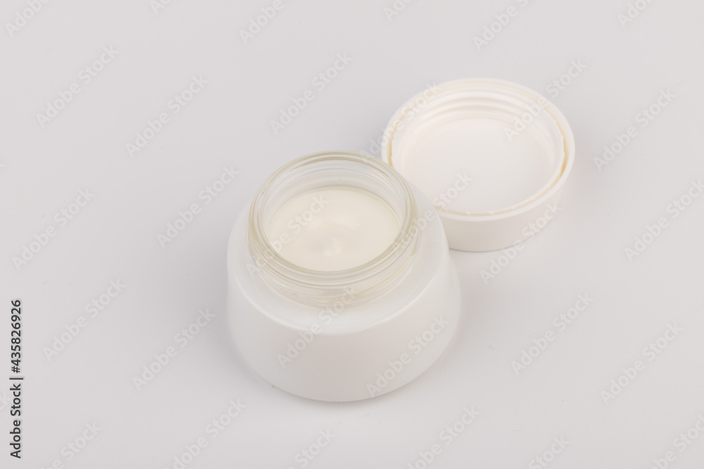 Beauty Cream Texture Close Up. Cosmetic Skincare Product In Jar On White Background. High Quality Beauty Cream Texture Close Up. Cosmetic Skincare Product In Jar On White Background. High Quality