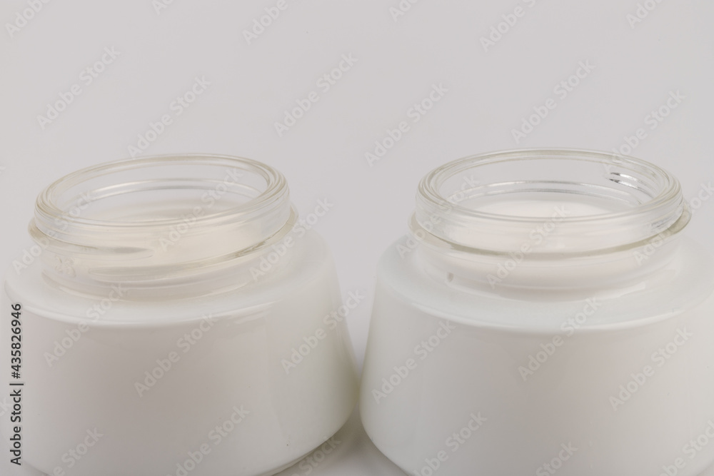 Beauty Cream Texture Close Up. Cosmetic Skincare Product In Jar On White Background. High Quality