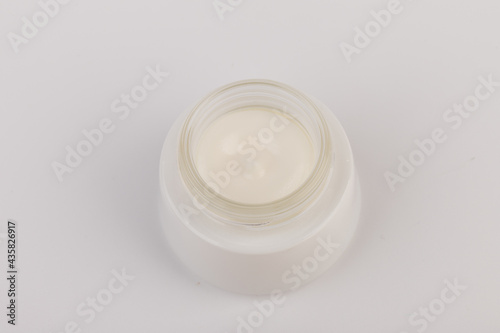 Beauty Cream Texture Close Up. Cosmetic Skincare Product In Jar On White Background. High Quality