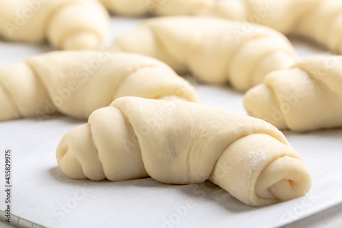 Process of making crescent rolled buns.