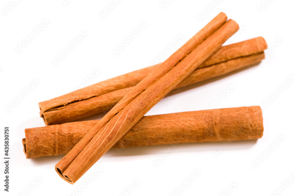 cinnamon quills isolated on white background cinnamon quills isolated on white background