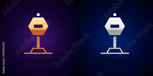 Gold and silver Stop sign icon isolated on black background. Traffic regulatory warning stop symbol. Vector