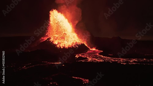Powerful volcanic eruption at night red glow Iceland 2021