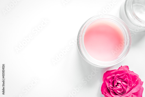 Nail care spa set with rose blossom, cream white background top view mockup