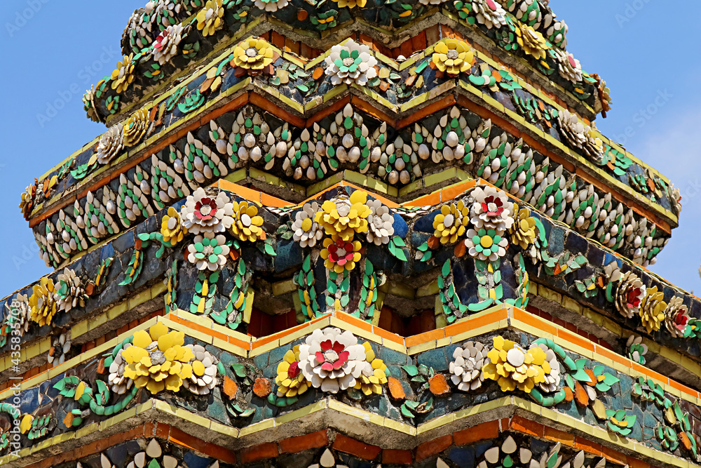Amazing Details of Colorful Ceramic Tiles and Seashells of the Stupa Calls Phra Maha Chedi Si Rajakarn in Wat Pho Temple Complex, Bangkok, Thailand
