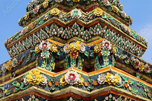 Amazing Details of Colorful Ceramic Tiles and Seashells of the Stupa Calls Phra Maha Chedi Si Rajakarn in Wat Pho Temple Complex, Bangkok, Thailand