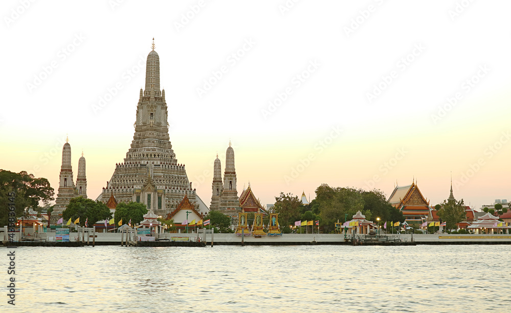 Stunning View of Wat Arun or the Temple of Dawn on the Chao Phraya River Bank in Thonburi District, Bangkok, Thailand