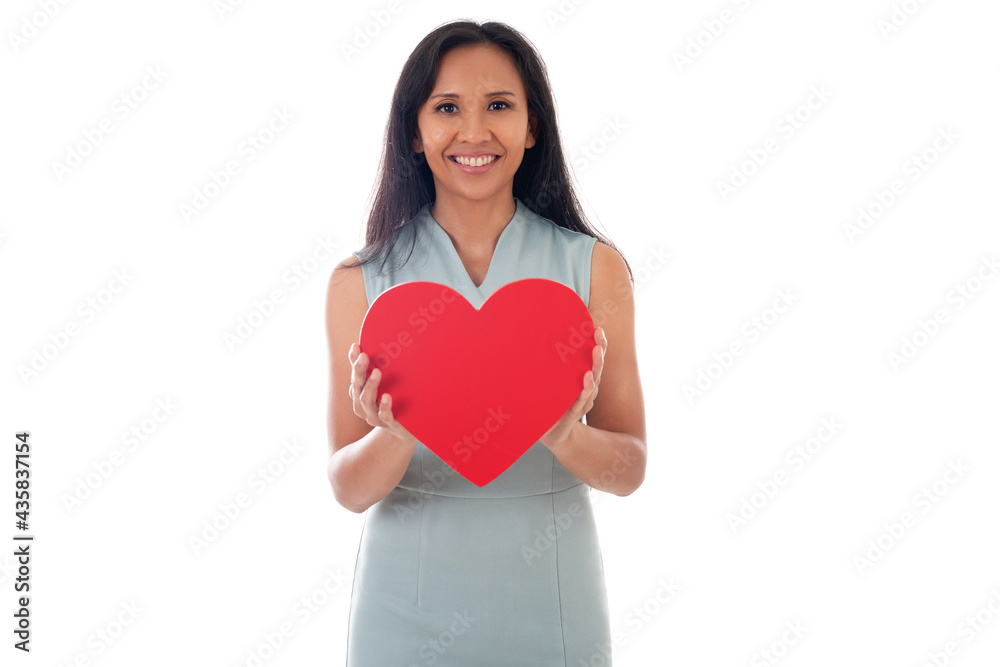 happy asian beautiful woman hold Love symbol red heart. Isolated on white background female model