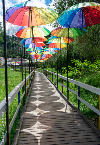 Walkway with colorful umbrellas in Campos do Jord  o