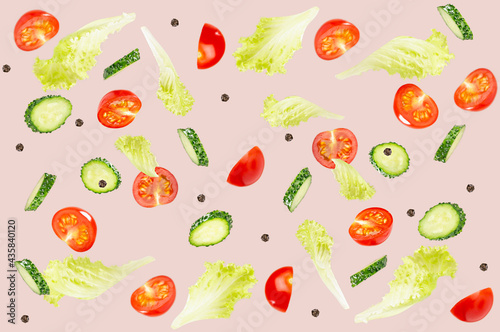 Ripe juicy slices tomato, cucumber, green salad levitate on beige background. Vegetable seamless pattern.