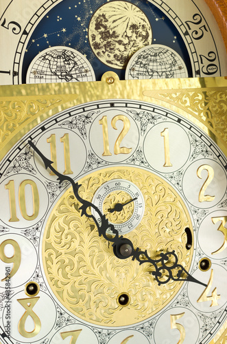 grandfather clock face and moon dial