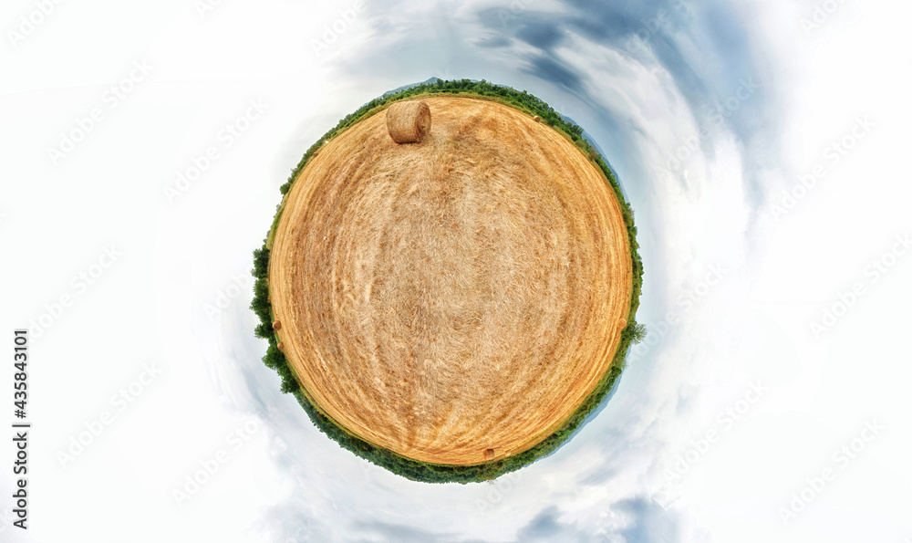 Stereographic projection of a a hay bale field. 360 degree panorama. Globe panorama. Stereographic projection of a a hay bale field. 360 degree panorama. Globe panorama.
