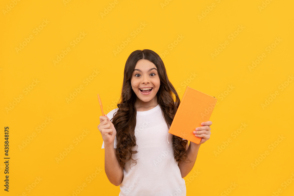 surprised school kid ready to study with bookand pen, knowledge surprised school kid ready to study with bookand pen, knowledge
